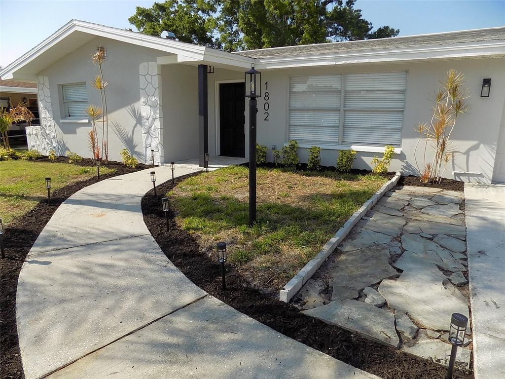 Photo of 1802 Chinaberry Drive, Oldsmar, FL 34677 (MLS # TB8439498)