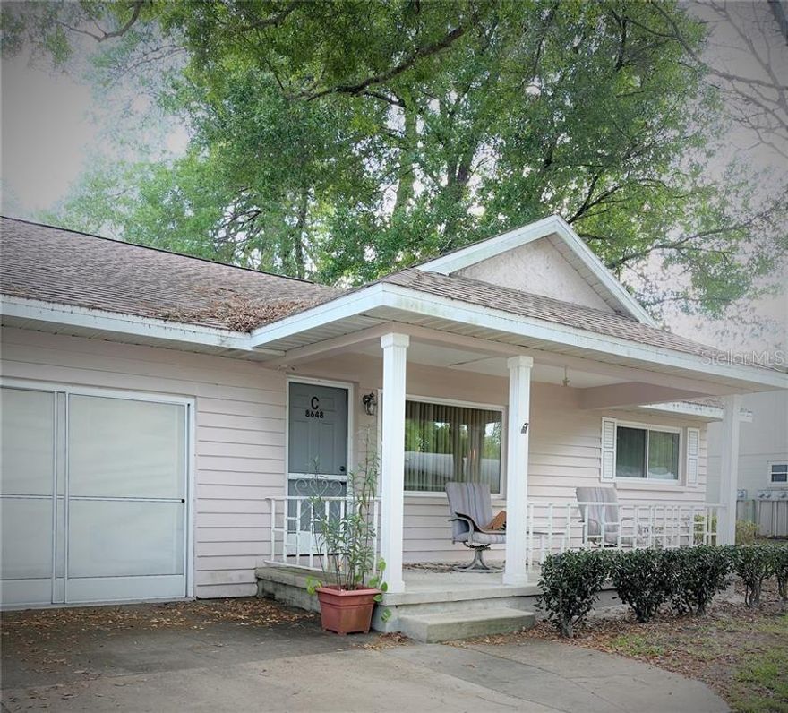 Furnished villa for rent in On Top of the World. This spacious Bostonian model features 2 bedrooms, 2 bathrooms, and a 2-car garage with tile flooring throughout. The home offers an open living and dining area ideal for entertaining, an updated kitchen with stainless steel appliances and a breakfast bar, and a great room with additional seating. The Florida room is under air and opens directly from the kitchen, providing extra space to relax and enjoy the Friendship Village community. The primary bedroom includes a large walk-in closet, and just off the Florida room is a fenced area perfect for pets. Enjoy the many amenities included in the lease. Minimum lease term is 6 months plus 1 week at $1,800 per month plus utilities. Pet-friendly. Property ID: 1952CFV.