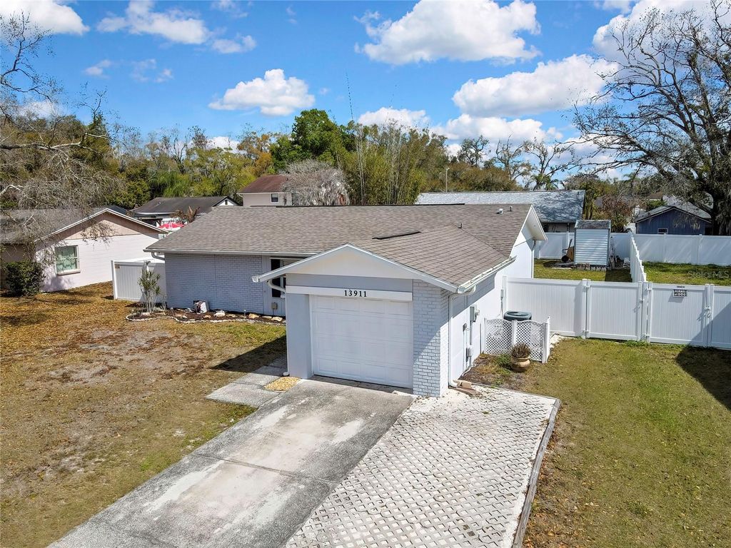 Photo of 13911 Pathfinder Drive, Tampa, FL 33625 (MLS # W7883634)