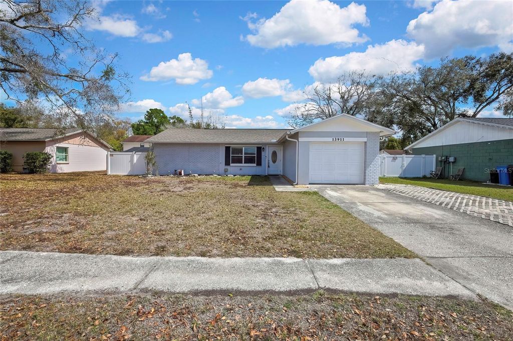 Photo of 13911 Pathfinder Drive, Tampa, FL 33625 (MLS # W7883634)
