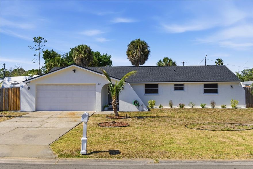 Beautifully updated 3-bedroom, 2-bathroom home with a 2-car garage, situated on a spacious ¼-acre corner lot in a highly sought-after area of Apollo Beach. This property offers a bright, open-concept layout enhanced by elegant 24x24 porcelain tile flooring installed throughout in a modern pattern. The kitchen has been tastefully renovated, featuring premium marble countertops, sleek cabinetry, and stainless steel appliances, creating a functional and stylish space ideal for everyday living and entertaining. A custom-built coffee and beverage station adds an extra touch of convenience and charm.
The living area seamlessly connects to a covered and enclosed side lanai through sliding glass doors, providing a comfortable indoor-outdoor living experience—perfect for relaxing mornings or evenings. The primary suite includes a fully upgraded bathroom with a custom-designed walk-in shower and dual shower heads, offering a spa-like feel.
Positioned on a generous corner lot, the home features a fully fenced backyard with a double gate and dedicated gravel area, ideal for storing a boat, RV, or other recreational equipment. The outdoor space also includes mature fruit trees such as lemon and lime, along with a well-maintained herb garden.
Major updates include a new roof and water heater installed in 2025, A/C system installed in 2019, and an impact-resistant front entry door. No HOA or CDD fees.
This property is truly move-in ready, with upgrades completed throughout. An excellent opportunity to own a well-maintained and upgraded home in a prime location.