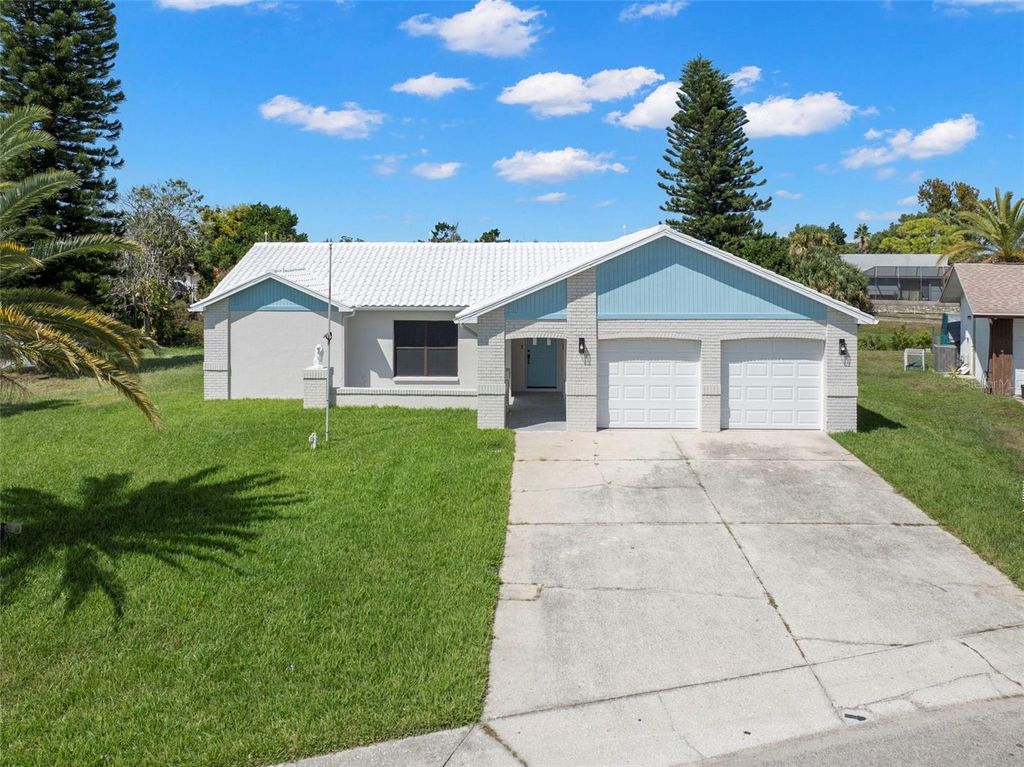 Photo of 7439 Vienna Lane, Port Richey, FL 34668 (MLS # TB8511944)