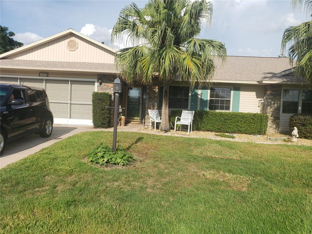 Photo of 26045 Newcombe Circle, Leesburg, FL 34748 (MLS # G5111530)