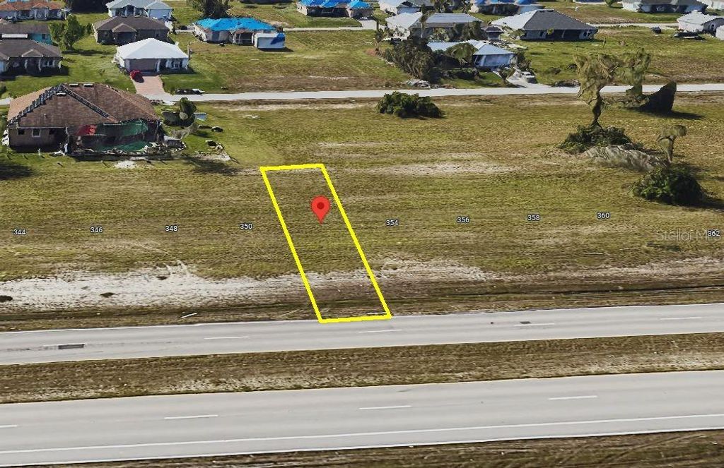 Photo of 352 Diplomat Parkway W, Cape Coral, FL 33993 (MLS # C7516544)