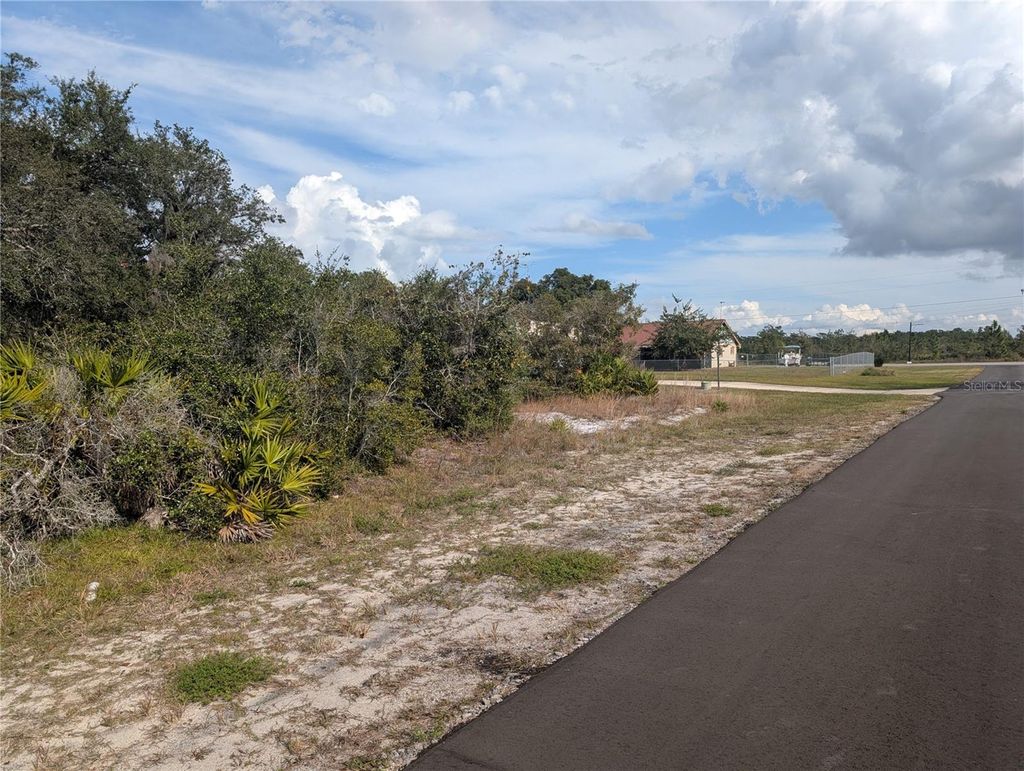 Photo of 8 Valencia Drive, Indian Lake Estates, FL 33855 (MLS # P4937270)