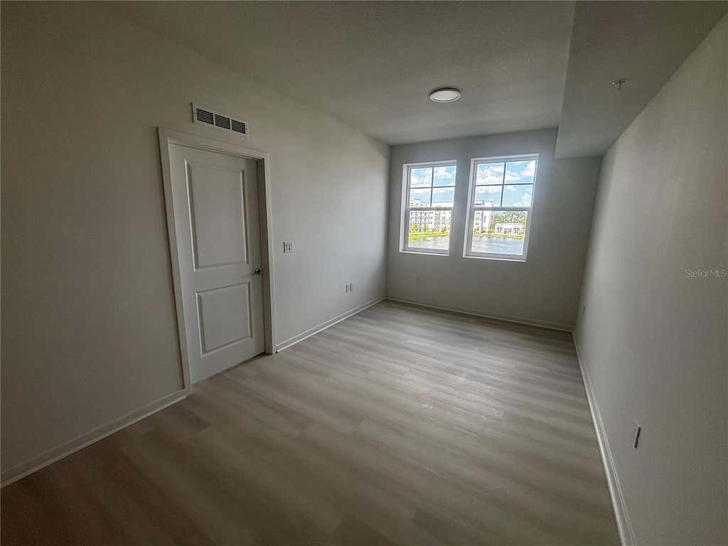 Photo of 5563 Millenia Park Boulevard #223, Orlando, FL 32839 (MLS # O6427495)