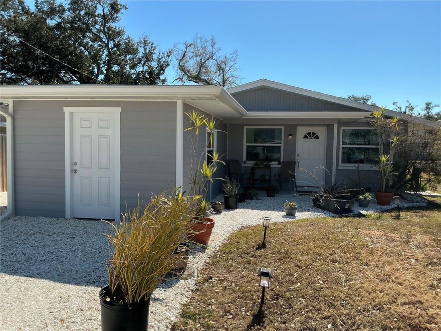 Cottage in the Pines - your perfect Sarasota starter, downsizer or investment. Well Built Florida Ranch in Quiet and Well Established Neighborhood. Nice, Clean, Cozy, Move in Ready home now available for sale. No HOA fees, no CDD fees, a true slice of Sarasota! Home features Comfortable living spaces, Large Primary bedroom with newer wood plank flooring, Second bedroom with terrazo floors, a Flex room, and one bathroom with walk in shower. Fully functional kitchen is a clean slate ready to update at new owners preference. House updates include; Landscaping, Shell driveway, Storage shed, Septic and Drain field, Water filtration system, Re-plumbing with PVC, Windows, Exterior door, Main Roof 2021, Flat roof with drip edge. Located in the HEART of sought after Sarasota, just outside of downtown and City limits, Near international airports, medical, grocery, world class fishing, iconic Siesta Key and St Armands Circle.