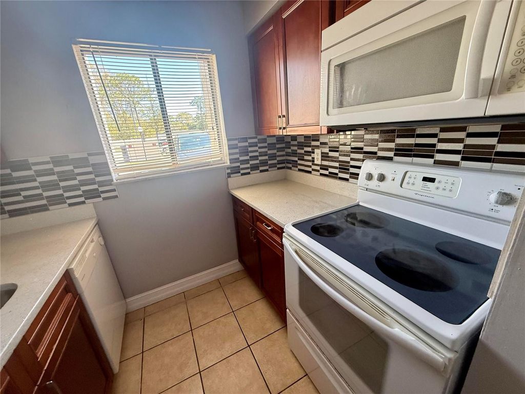 Photo of 127 Springwood Circle #F, Longwood, FL 32750 (MLS # O6389992)