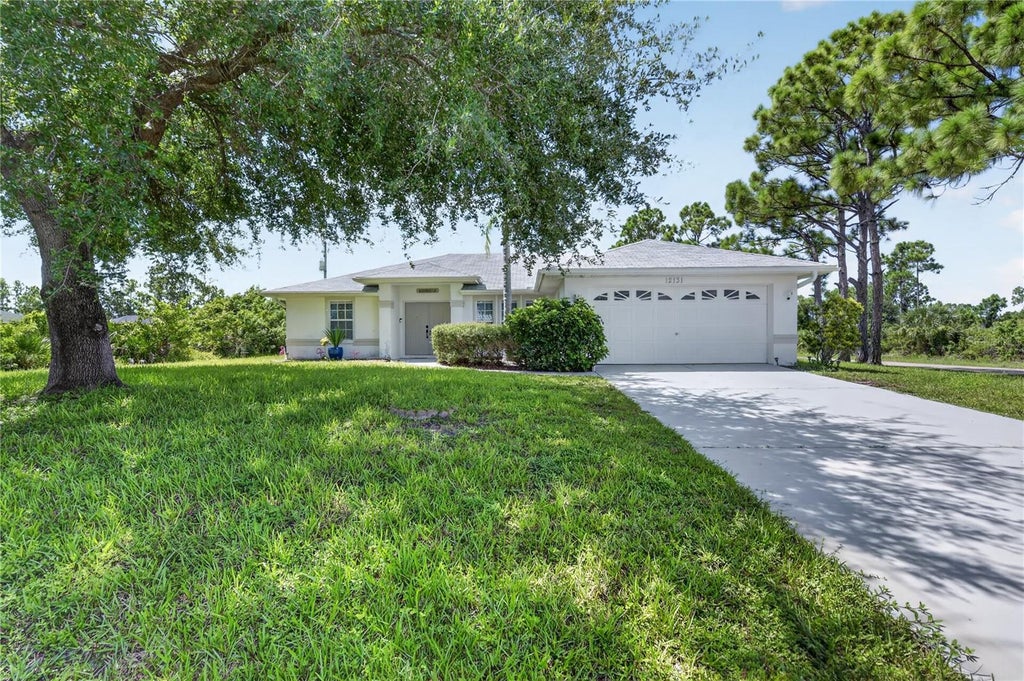 Photo of 12131 Vaughan Avenue, Port Charlotte, FL 33981 (MLS # N6145263)