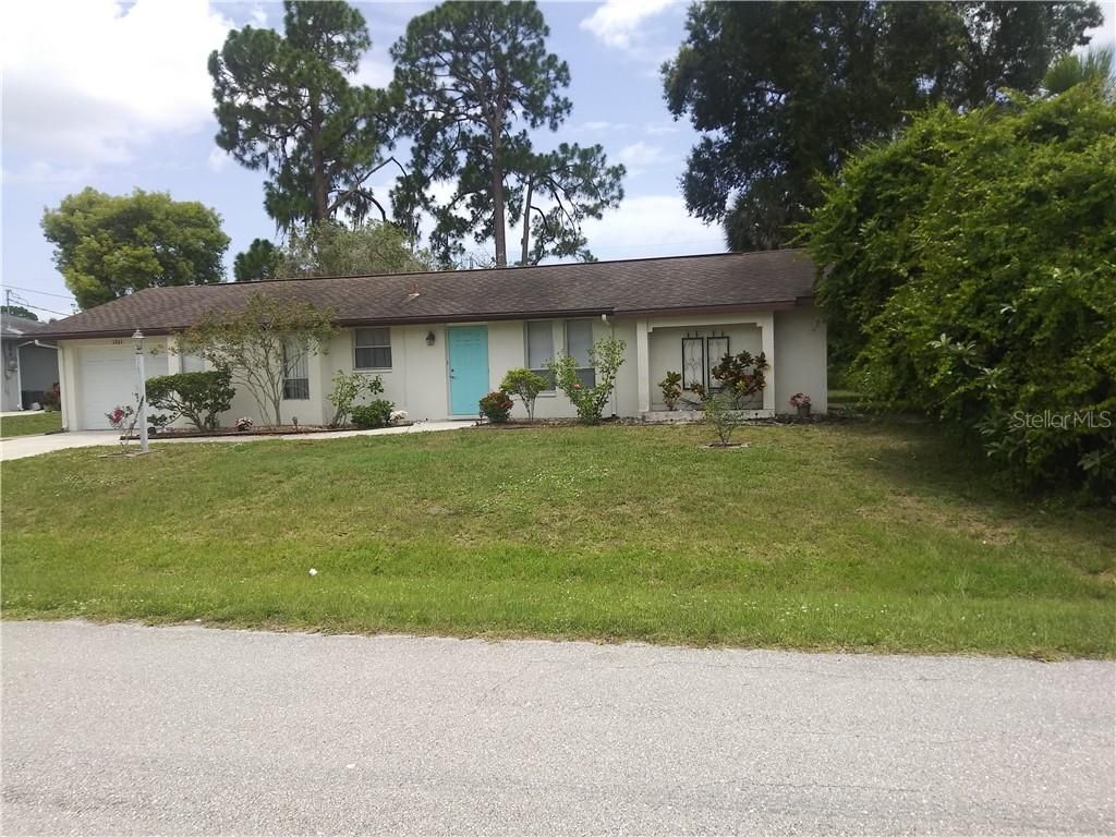 Photo of 1261 Joplin Avenue NW, Port Charlotte, FL 33948 (MLS # C7433365)