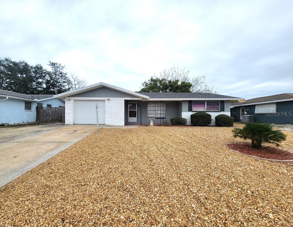 Welcome Home!
This recently updated 3-bedroom, 2-bathroom home is ready for you to move in and make it your own! With its modern touches, spacious layout, and prime location, this home offers everything you need for comfortable living. Don’t wait—homes like this don’t stay on the market for long!
Property Highlights:
*Covered Front Porch: Relax and enjoy your morning coffee on the cozy front porch.
*No Carpet: Tile flooring throughout for easy maintenance and a clean, sleek look.
*Fresh Interior Paint: Newly painted interiors in neutral tones, ready for your personal touches.
*Spacious Living Room: Large and inviting space perfect for entertaining or unwinding after a long day.
*Open Floor Plan: Seamless flow between living spaces
*Updated Kitchen: Featuring wood cabinets, granite countertops, and a decorative backsplash—perfect for cooking and entertaining.
*Master Bedroom: with its own updated en-suite bathroom.
-Brand New Master Bath Shower
*Updated 2nd Bathroom
*Generously Sized Bedrooms
*Laundry Area in Garage: Equipped with washer and dryer hookups for your convenience.
*1-Car Oversized Garage: Plenty of space for parking, storage, or a small workshop.
*Brande NEW Windows & Back Slider- to keep the cool air in, in those FL hot summer days!
*Spacious backyard, perfect for outdoor activities or pets.
*Rock Front Yard
*Pet Friendly: Breed Restrictions Apply