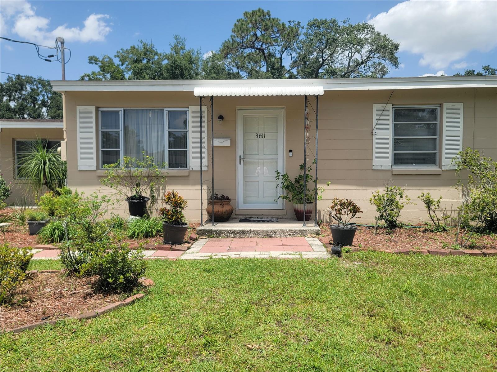 Located in the Washington Shores neighborhood of Johnson Village, this lovely home with 2 bedrooms and 1 bathroom. The roof and water heater were recently replaced in 2021, ensuring the property is in good condition. Just minutes from Downtown Orlando, Millenia Mall, and Universal Studios, this home provides easy access to everything you need, with convenient access to I-4. One of the great advantages of this property is that there is no HOA fee, allowing you to enjoy the property without additional monthly charges. Home is on just under a quarter of an acre. Additionally, the lower property taxes make this an excellent option for first-time buyers or those seeking an intelligent investment. An ideal property for those looking for a peaceful home or investors seeking new opportunities.
