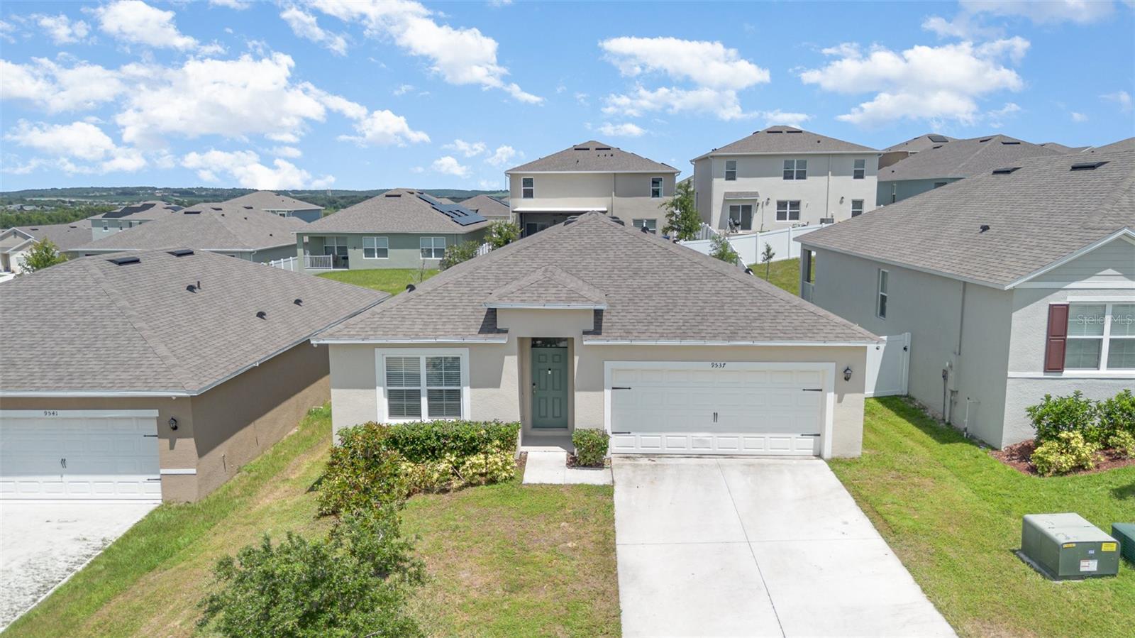 Welcome to this stunning 2023-built single-family home located in the heart of Clermont (34715). Featuring 4 spacious bedrooms and 2 full bathrooms, this beautifully designed home offers 1,846 heated square feet of modern living space. Sitting on a 0.14-acre lot, it boasts a private backyard, attached garage, and a brand-new 2025 HVAC system for year-round comfort. With contemporary finishes throughout and move-in ready appeal, this property is perfect for homeowners seeking style, efficiency, and convenience. Don’t miss the opportunity to make this like-new gem your own!