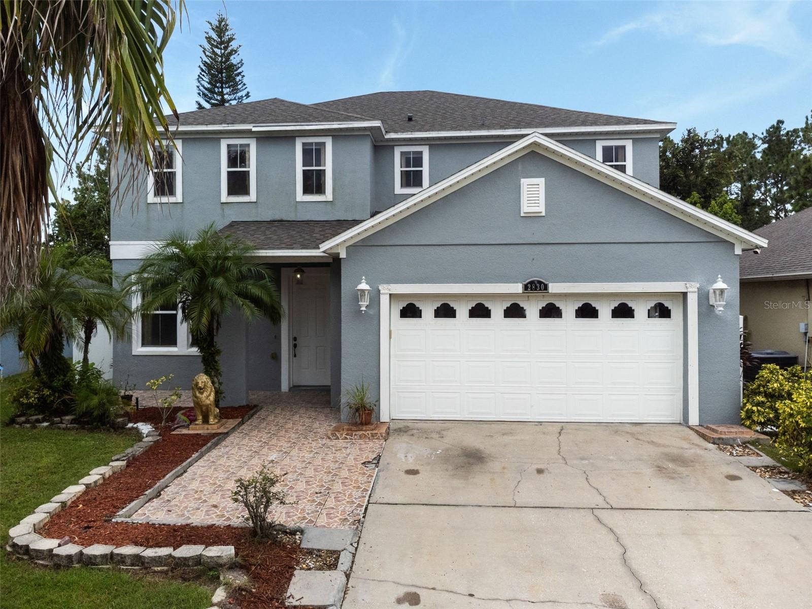 Welcome to the gated Heritage Lake Community! This contemporary 4-bedroom, 3-bathroom home has no neighbors in your backyard!! Located near SR 417 and Florida's Turnpike, this home is a short drive to all the excitement of the Walt Disney World Resort, Universal, and SeaWorld. You are just around the corner from the Orlando International Airport, which is the home of the Brightline Railroad station for easy trips to the Miami area. Enjoy a short walk to Walgreens Pharmacy or the Walmart Neighborhood Market. The home offers an open floor plan, where the kitchen has stainless steel appliances, new granite tops, and an island that has an eat-in countertop that can be used as a breakfast bar! The primary bedroom is very spacious, measuring 19x20 and features an ensuite bathroom with a large garden tub and a separate shower stall – all bathrooms have new granite countertops. Upstairs has new luxury vinyl flooring throughout. The home also has a 12x10 loft that could be used for an office or game area. A new Roof was installed in 2023. Enjoy entertaining on the oversized, tiled 40x13 enclosed back patio. The community of Heritage Lakes features a pavilion, playground, and trail around the pond. Schedule your tour today.