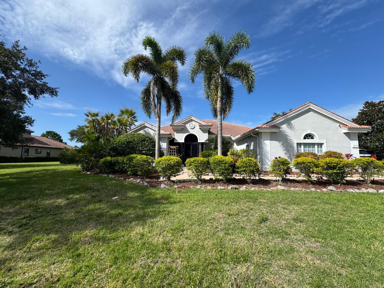 Welcome to this stunning completely remodelled 4-bedroom, 3 bath, 3 car garage, POOL/SPA home on an oversized lot in the highly desirable Preserve at Panther Ridge Community. Driving up to your future home, you will admire the rich curb appeal, lush professional landscaping, oversized driveway, and spacious side-loading 3 car garage. The welcoming elevated double door entryway reveals an open concept floor plan, high ceilings, and ample living space giving your future home an open feel. Inside this home offers crown molding throughout, luxury vinyl flooring, and formal dining! The centrally located kitchen features stainless steel ZLINE appliances, quartz countertops, plenty of cabinet space for storage, closet pantry, and kitchen sink island. This home was designed with privacy in mind with a split bedroom floor plan sure to please the whole family. The Primary's suite offers beautiful crown molding, high ceilings, and private sliding glass doors to the lanai. The en suite bathroom features dual vanities, relaxing soaking tub, walk-in shower, and private water closet. The home also offers three spacious guest bedrooms with high ceilings and plenty of closet space. Enjoy true Florida outdoor living with your spacious paver patio with stunning lakefront views and FULLY SCREENED lanai boasting in-ground POOL with overflow SPA! Your future home provides exclusive privacy and also the entertainment you are looking for! Close to Lakewood Ranch and downtown, shops, restaurants, top rated schools, and world class beaches. The Panther Ridge community offers walking trails, wildlife and nature preserve, park/playground, and tennis/basketball courts.
