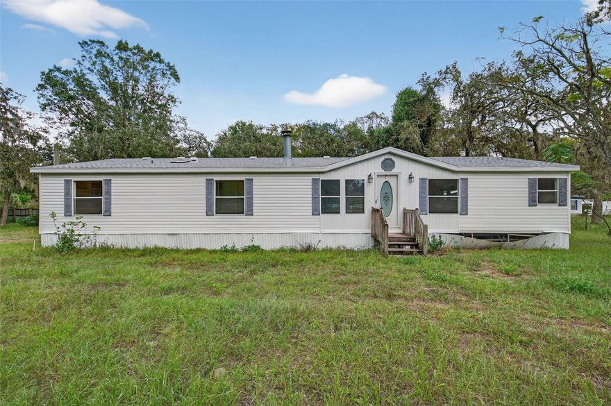 Welcome to a fantastic opportunity to own a property with endless potential. This manufactured home sits on a HUGE lot, offering plenty of space to expand, garden, or simply enjoy the outdoors. The home itself is a blank canvas ready for your personal touch, with cosmetic updates needed to bring it back to life. Step into the screened-in Florida room, perfect for relaxing year-round, and take advantage of the workshop/shed in the back ideal for hobbies, storage, or additional workspace. Conveniently located close to the highway, schools, and restaurants, this property offers both privacy and accessibility. Please note: septic system age and condition are unknown and buyer should verify. Whether you're an investor or a homeowner looking for a project, this property has great potential to shine.

*Please review showing instructions in the attachments. Showing instructions MUST be read.*

The information provided herein should be verified by the Buyer/Buyer's agent, and is not guaranteed by the Seller or Listing Agent.

BUSINESS HOURS MONDAY THROUGH FRIDAY 9A-5P.
