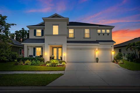Photo of 7631 Paradiso Drive, Apollo Beach, FL 33572 (MLS # TB8519498)