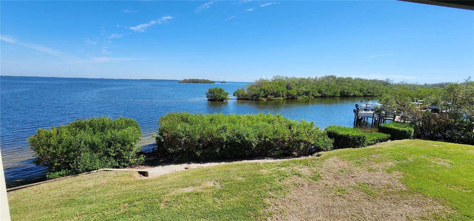 AVAILABLE September 1st as a 12 month minimum rental. This 1-bedroom, 1-bathroom fully furnished (turnkey) unit on the 2nd floor offers incredible waterfront views of Tampa Bay, including the Sunshine Skyway Bridge and beautiful sunrises. Located in desirable Building "A," the resort features amenities like tennis and pickleball courts, a heated pool, hot tub, and an observation pier with gas barbecue grills. The clubhouse includes a fitness center, meeting room, and laundry facilities. The property is jet ski-friendly with boat docks and trailer parking, and an 800-foot boat launch at nearby at Fort DeSoto Park, known for its top-ranked beaches and biking trails. Bikes, Kayaks and paddle boards can be stored and launched on-site, and fishing opportunities are plentiful off the dock. Conveniently situated near beaches and downtown St. Petersburg and Tampa, this is a peaceful retreat available Long term at $2000/month for qualifying renter.