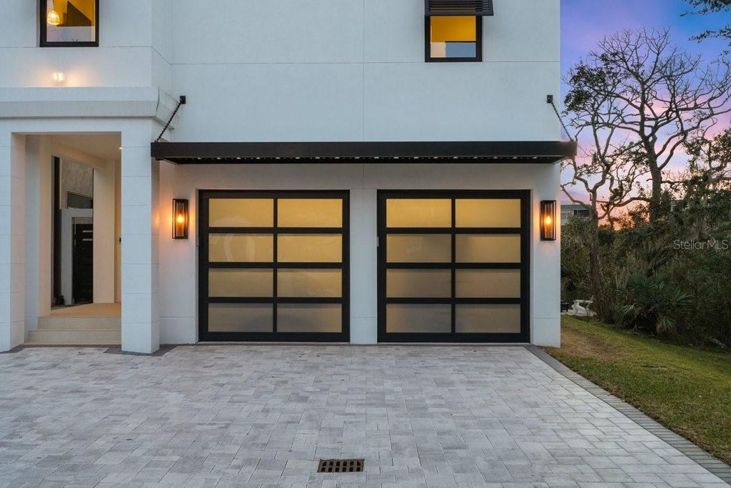 Photo of 552 S Peninsula Avenue, New Smyrna Beach, FL 32169 (MLS # NS1087459)