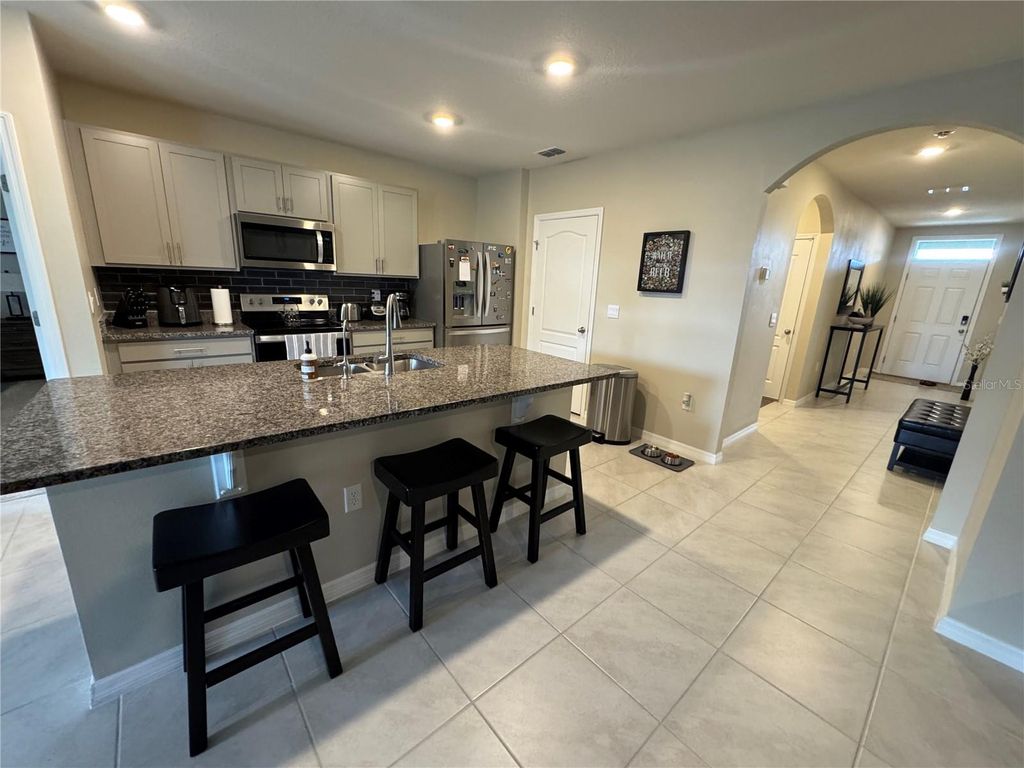 Photo of 3593 Yarian Drive, Haines City, FL 33844 (MLS # O6405683)