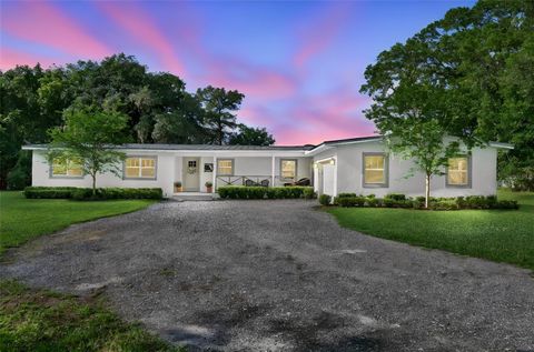 Photo of 7740 Lake Dawn Dr, Winter Park, FL 32792 (MLS # O6410689)