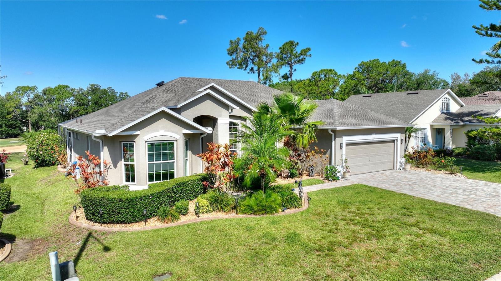 Quite simply one of the best lots in the secluded Souther Dunes award winning Golf Community.This home must be seen to fully appreciate its modern open plan feel, huge pool deck and amazing view of the 16th green on the golf course to the rear of the pool deck.As you walk in to the property you are struck by its open plan feel and how easily the home flows from one room to the next.The owner just fitted a new roof in 2024 and a westinghouse water treatment system including reverse osmosis drinking water direct from the tap in the kitchen.The master en suite was also completely re modeled in late 2024, his and hers closets were remodeled by closets by design.When entering the home you have an open plan dining area coupled with secondary lounge looking out on to the large oversized pool deck. Beautiful kitchen with granite counter tops and upgraded cabinets. Built in appliances and breakfast bar.There is also a breakfast nook that has a 180 degree window offering a great view of the pool and golf course. Large master suite with freshly remodeled tub, dual sinks and walk in shower. Three further spacious bedrooms are featured in the home , so one could easily be used as an office for those working from home. The pool area has extra space for sunbathing and summer kitchen. Extra features include security system, awning in pool area, motorized screen door in garage and extra wide driveway with brick pavers.Quite simply a very rare opportunity to own well presented and maintained home that you will instantly fall in love and can move right into.