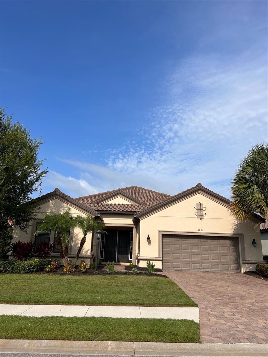 LOCATION, LOCATION, LOCATION. Absolutely stunning single family home available in the sought after community of Esplanade Golf and Country Club of Lakewood Ranch. The popular Pallazio floor plan is fully turnkey furnished and ready for your stay. This neat as a pin home has 3,147 square feet, 4 bedrooms plus a den, 3 bathrooms, large open floor plan, 10 foot ceilings, living room/kitchen/dining room combination, crown molding, plantation shutters and split bedrooms. The kitchen has high end stainless steel appliances, subway tile backsplash, built in gas stove with vent hood, wood cabinets, Calcutta quartz countertops, pantry and a massive center island with seating. The primary bedroom has a french door entry way, tray ceiling, walk in closet with custom built-ins, on suite bathroom with full wall glass/tile walk in shower, double sinks and a water closet. The first guest bedroom has a queen sized bed with on suite bathroom with a stall shower. The second guest bedroom has a queen bed and the third two twin beds. Guest bathroom has a tub/shower combination. The home has a large extended screened lanai with a summer kitchen, a sitting area and dining table. There is also a laundry room with utility sink and a two car garage. Walkable to the community pool. Enjoy resort style living with a Golf Course and amenities privilege for $250 each guest plus $100 Association fee (does not include greens fees and cart fees), Lagoon style pool, full service Tiki Bar, State of the Art Fitness Center with classes, Day Spa, Tennis Courts, Bocce Ball, Pickle Ball and much, much more! Call today as this will not last long!!