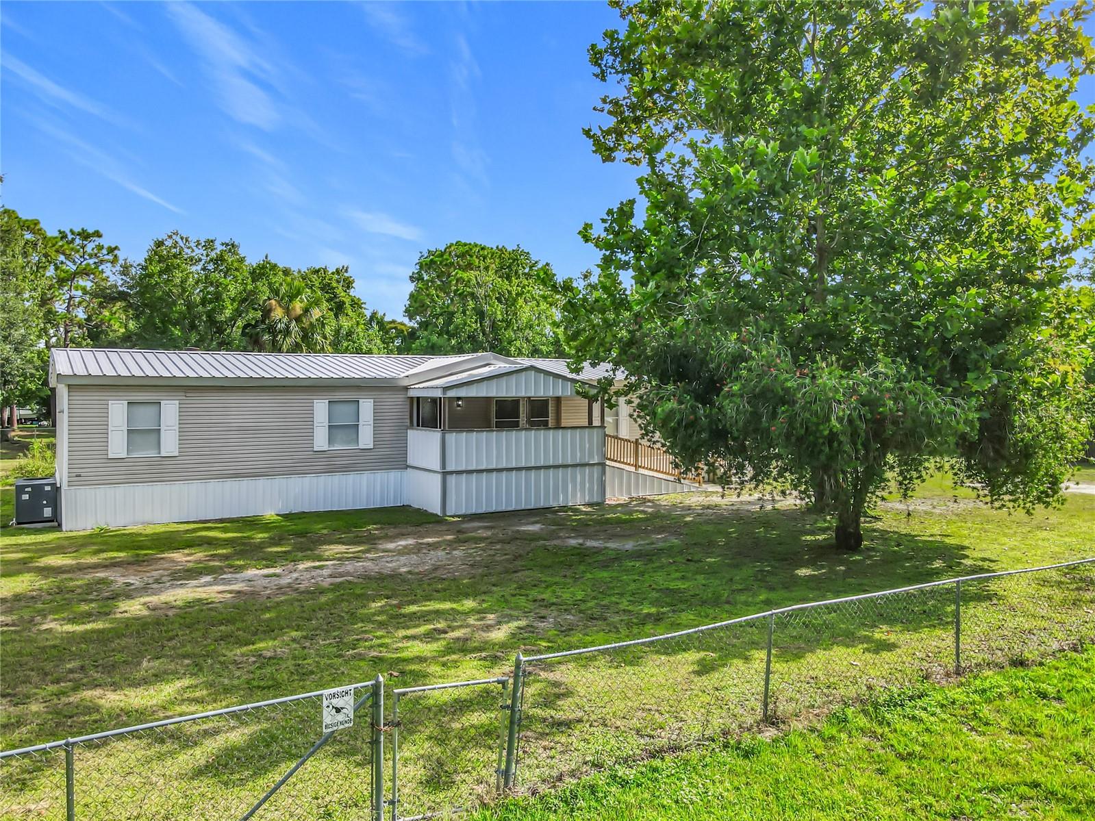 Welcome Home! Come see this beautiful and spacious 4-bedrooms and 2-baths Home close to Bithlo Community Park, Welcome Home! Come see this beautiful and spacious 4-bedrooms and 2-baths Home close to Bithlo Community Park, HUGE 44' x 40' Metal Shed conveniently located away from the house with two entrances and 2 gates. Enjoy this beautiful open concept of living room, kitchen, and family room with a fireplace, The master bedroom is conveniently separated from the other bedrooms for privacy featuring a sliding glass door that opens to a large deck, perfect for outdoor entertainment. Fully REMODELED Kitchen with NEW cabinets, NEW QUARTZ counter top and NEW Appliances, NEWER Roof, NEW water heater, NEW light Fixtures, NEW vinyl floor plank, NEW Baseboards, NEW interior doors, NEW Ceiling fans with remote control, Fully REMODELED master bathroom and guest bathroom, NEW wall and ceiling texture, NEW interior paint, NEW Septic Tank, this beautiful House is conveniently located near various amenities such as shopping, restaurants, parks and recreation!