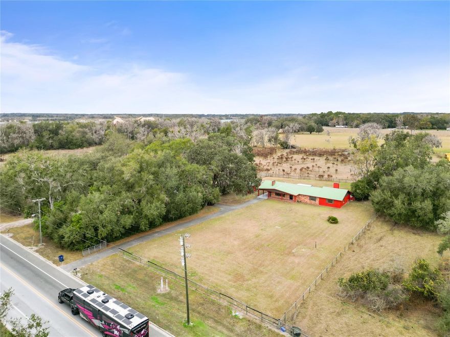 Flexible Owner-Occupant Opportunity with Neighborhood Commercial Opportunity.  Located within the City of Center Hill and fronting W Kings Highway, this unique property offers a rare opportunity for buyers seeking to live, operate, and grow in place. Improved with an existing residence, the site provides immediate usability while also presenting an opportunity for Neighborhood Commercial (CN) zoning. This corridor supports a strong, built-in employee base tied to nearby agricultural, processing, manufacturing, and service employers, creating consistent demand for everyday services and convenience-based uses. The property is well suited for owner-occupied professional or service operations such as a small medical or wellness practice, barber or salon, office-based business, instructional or training use, or similar low-impact commercial activity compatible with neighborhood commercial intent. A particularly compelling opportunity exists for owner-operators with mobile or service-based businesses, including food truck owners. The layout allows for on-site living while operating a lunch or daytime service model that caters directly to nearby workers—offering a rare blend of residential comfort and business visibility along a well-traveled collector roadway connecting Sumter and Lake Counties. Unlike raw land or speculative commercial sites, this property allows a buyer to operate immediately, control occupancy costs, and retain long-term flexibility as the surrounding corridor continues to evolve. Operate Now. Adapt Later. Serve a Built-In Workforce. Just over 1 acre with W King’s Hwy Frontage. Call today!