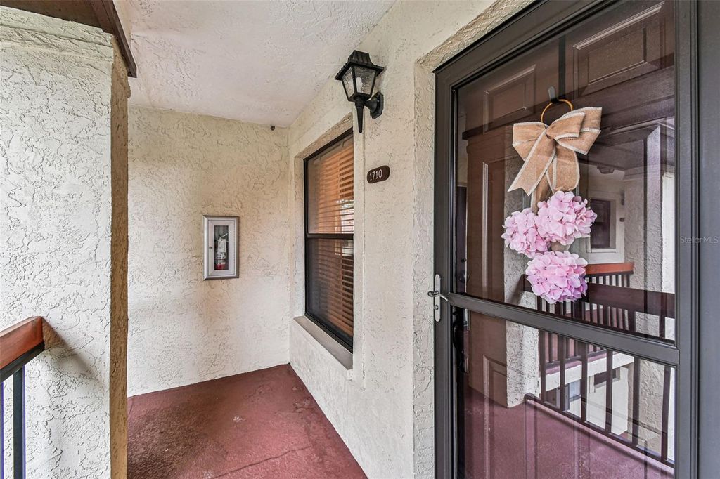 Photo of 1710 Hammock Pine Boulevard #1710, Clearwater, FL 33761 (MLS # TB8429854)