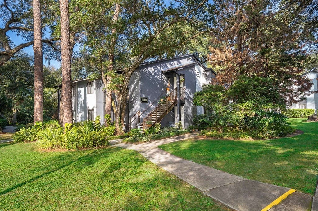 Photo of 180 Waterfall Way #203, Altamonte Springs, FL 32714 (MLS # O6453791)