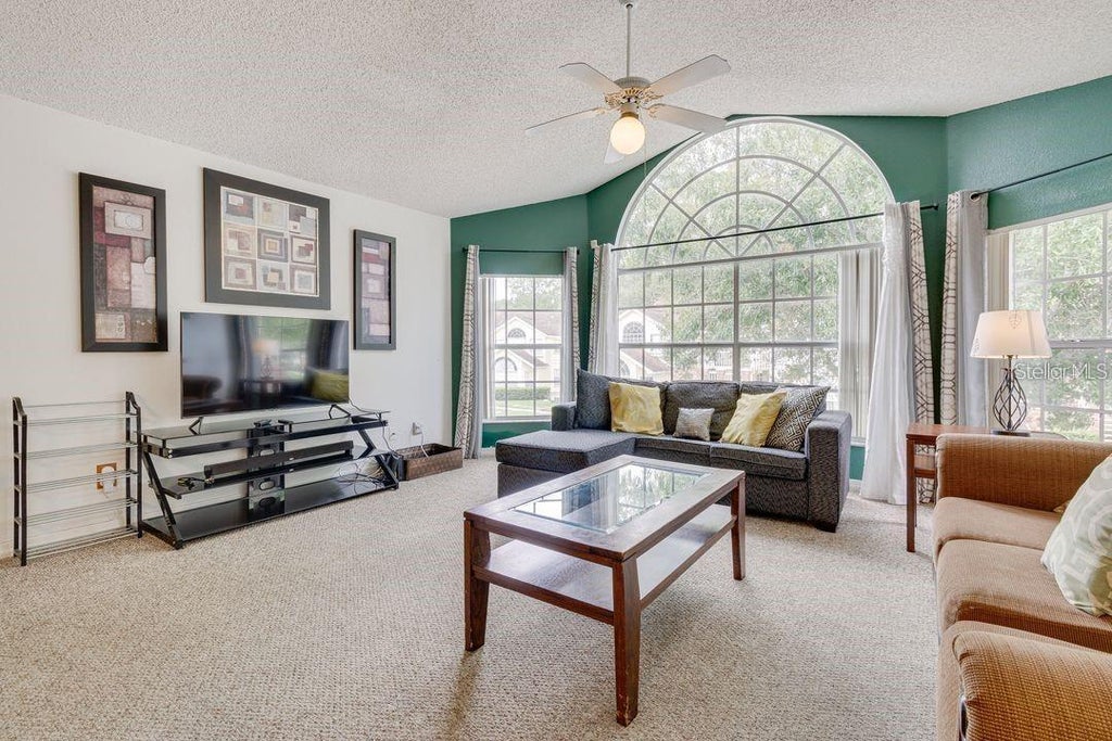 Photo of 5004 Laguna Bay Circle #54, Kissimmee, FL 34746 (MLS # O6452346)