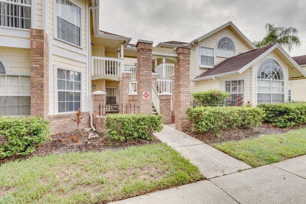 Photo of 5004 Laguna Bay Circle #54, Kissimmee, FL 34746 (MLS # O6452346)
