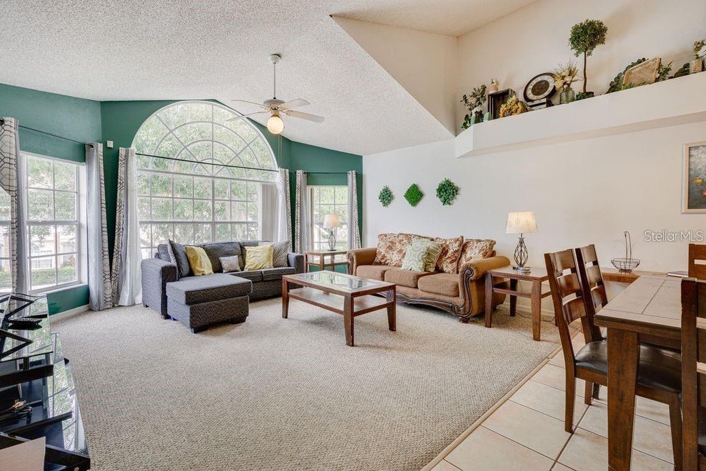Photo of 5004 Laguna Bay Circle #54, Kissimmee, FL 34746 (MLS # O6452346)