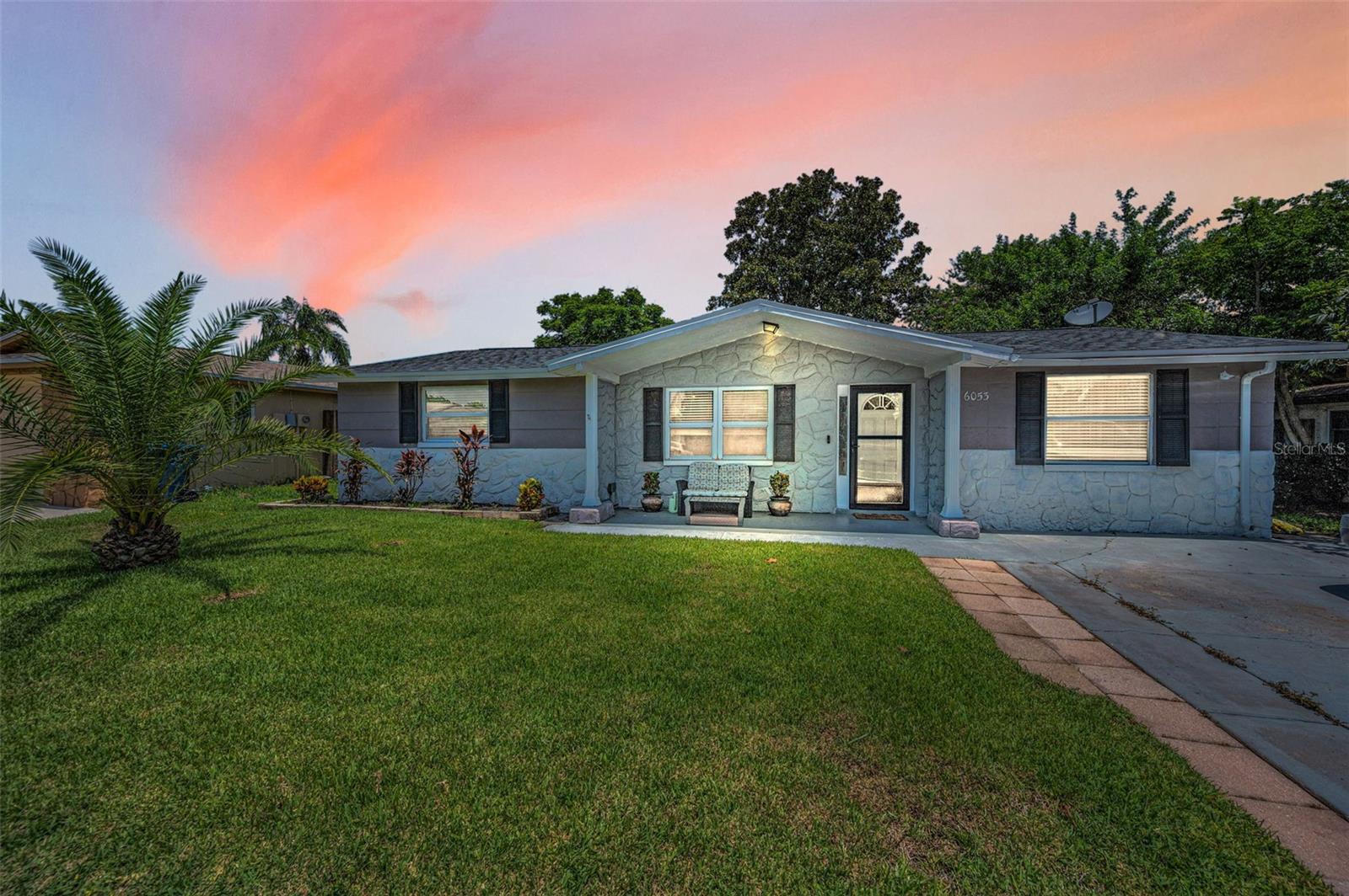 This adorable 3 bed 2 bath home is turn key. The Kitchen boasts Granite countertops with a custom built matching island. All matching Frigidaire appliances. Laminate flooring. Newly updated water softener. Converted Saltwater in-ground pool. 6 foot Privacy fence with irrigation system. Water Spickets built into fencing. Beautifully landscaped with irrigation systems. Fully Permitted Storage Shed with lighting, and electrical hook ups. This home comes complete with fitted hurricane shutters for additional protection. All of this is Conveniently located on a quiet street in the beautiful Holiday Gardens Estates community. Easy access to prime shopping, medical, schools, parks and beaches. Roof 2021