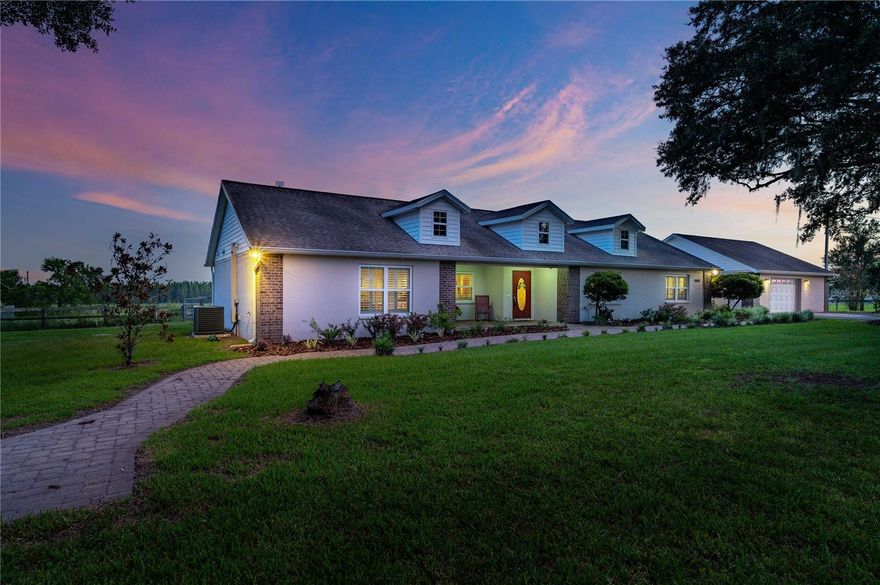 Welcome home to a peaceful country setting in the desirable Saint Joseph area of Dade City. This beautifully maintained custom home sits on approximately one acre and offers wide open views of rolling hills and lush pastures. You will enjoy the quiet environment and the feeling of space, while still being just minutes from SR 52 and I-75 for easy access to Tampa, Wesley Chapel, and surrounding areas.
This upgraded home features three large bedrooms, each with its own ensuite bathroom, plus an additional bonus room that can be used as an office, guest space, or playroom. The kitchen is spacious and well-designed, with plenty of room for cooking and gathering. The family room and formal dining area are filled with natural light, and the screened 50 ft back porch is the perfect place to unwind and take in the views.
The home also includes a laundry room with built-ins and sink, powder room for guests, and a spray-foam insulated attic running the length of the house for convenient and abundant storage. The oversized detached garage provides room for a full-size truck and workshop space, along with additional attic storage.
This rental includes the house, detached garage, and approximately one acre surrounding the home. The property is private, quiet, and move-in ready.
Available for $3,500/month.
6-stall Horse Barn, Pole Barn and 8 acres of pasture access available for an additional monthly amount if desired. This option is ideal for those with horses or hobby livestock. Details can be discussed based on needs.
Schedule a showing and experience the peaceful setting for yourself.