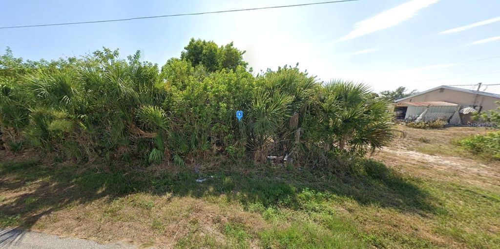 Photo of 9676 Arnaz Circle, Port Charlotte, FL 33981 (MLS # A4669373)