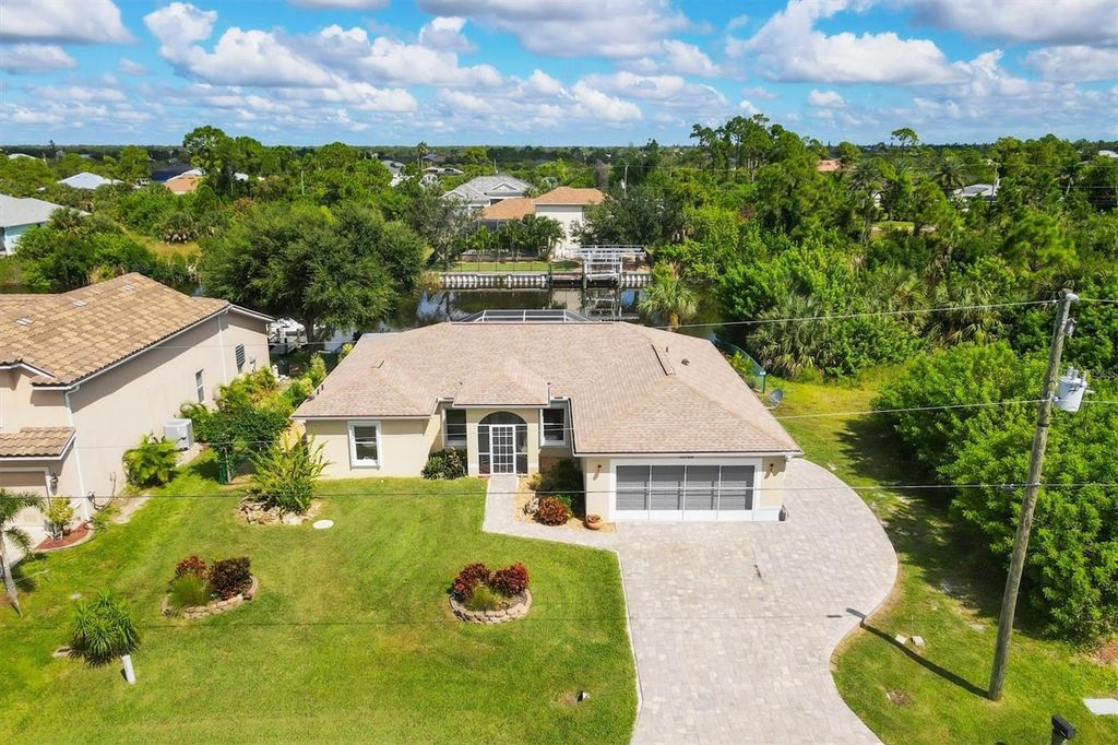 Photo of 15168 Hennipen Circle, Port Charlotte, FL 33981 (MLS # D6143977)