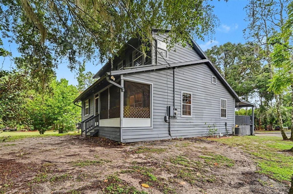 Photo of 490 Pine Woods Road, Ormond Beach, FL 32174 (MLS # TB8531450)