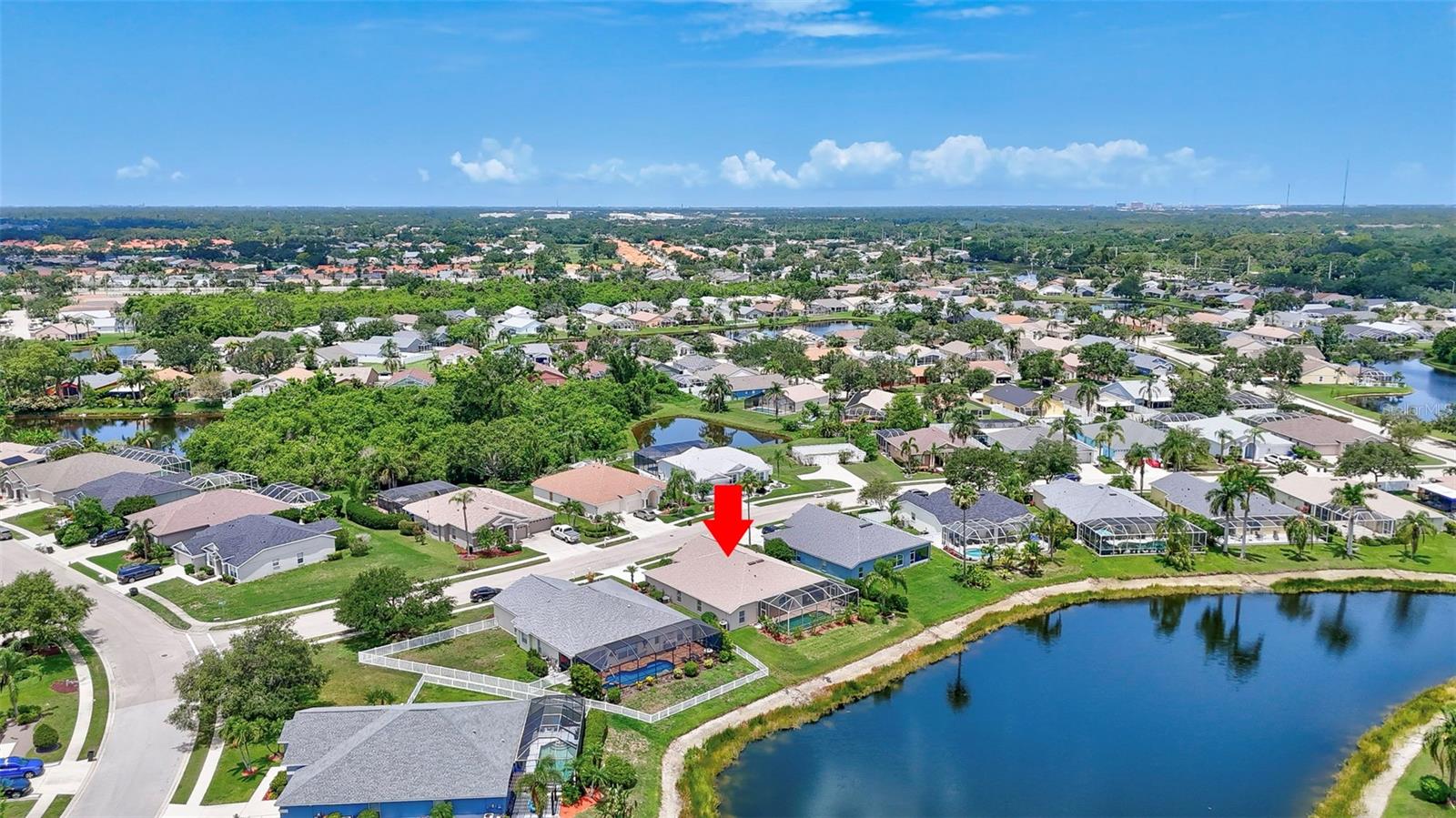 Spacious lakefront private pool home in wonderful Sabal Harbor, located conveniently close to the highway, shopping, restaurants, and beaches! The community offers a stunning heated pool, club house, tennis/pickleball courts, basketball court and playground; all without CDDs and for an extremely low HOA fee! This four bedrooms, 2 bathrooms heated pool home being offered turnkey furnished. It is ideal for a family moving to town or an investor wanting a 2nd home with great rental potential. This is a second home for the seller and shows pride in ownership throughout. The home is light and bright, ready for new owners. The kitchen is vast and features a bar, granite counters, pantry, a breakfast corner and built in desk area. Separate family and living room areas give options for family gatherings or peaceful relaxation. There is also a large bonus room that is currently set up as a game room but could easily be a library, den or 5th bedroom. The bedrooms are split with Master on the left side, and 3 other bedrooms and the laundry room on the right side, sharing the 2nd bathroom, which also serves as a pool bathroom. The Master bathroom has a garden tub, walk in shower, private toilet and double vanities. The walk-in closet is a good size and has been partitioned to create a separate lockable room, perfect for an owner looking to rent but wanting private storage space. The pool area has a covered space for outdoor dining and is overlooking a pond. The roof was replaced in 2022, and the pool cage in 2025. Spacious 2-car garage. Don’t miss this fantastic opportunity!