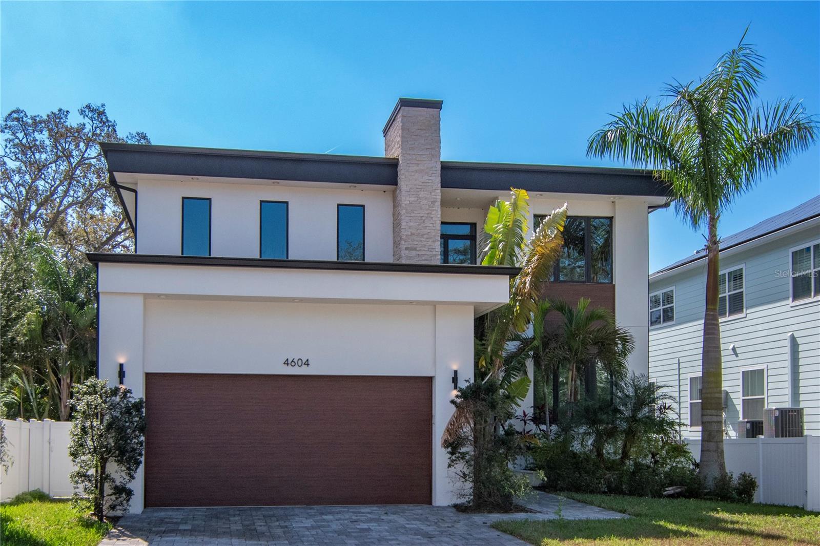 Welcome to this exquisite CUSTOM BUILT home nestled in the HEART OF SOUTH TAMPA, offering the epitome of the coveted Tampa Bay lifestyle right at your doorstep. Meticulously crafted with unparalleled attention to detail, this 4 BEDROOM, 4.5 BATHROOM LUXURY RESIDENCE is a testament to refined living with each room having THEIR OWN EN SUITE BATHROOM AND WALK-IN CLOSET, ensuring privacy and comfort for every member of the household. The open-concept design, adorned with LED TRAY CEILING LIGHTING, creates a spacious and inviting ambiance throughout the home's expansive 5,538 TOTAL SQUARE FEET. The CHEF'S KITCHEN, located downstairs, features top-of-the-line Wolf appliances and all the amenities one could desire. NATURAL LIGHT floods the interior, complementing the thoughtful layout which includes a PRIMARY BEDROOM DOWNSTAIRS and TWO LAUNDRY ROOMS for added convenience; one upstairs & another downstairs. Upstairs, a versatile LOFT awaits, ready to be transformed into a home THEATER, GYM, GAME ROOM, LIBRARY, or whatever your heart desires. REAL ENGINEERED HARDWOOD FLOORING graces the upper level, adding a touch of sophistication to the space. Step outside to discover a luxurious oasis complete with a sparkling POOL AND SPA JACUZZI, perfect for indulging in the ultimate outdoor relaxation and entertainment. The front of the home showcases extended PAVERS and SOLAR PANELS, exemplifying both elegance and sustainability. Nestled in a PRIME LOCATION just off WESTSHORE BOULEVARD, this property offers EASY ACCESS TO BAYSHORE, HYDE PARK, DOWNTOWN TAMPA, AND ALL MAJOR HIGHWAYS. With proximity to local beaches and airports, convenience is paramount. Situated within the sought-after Plant High School District, this home presents a rare opportunity to experience luxury living at its finest. Could be rented unfurnished or furnished. Optional totally furnished please call for pricing.
