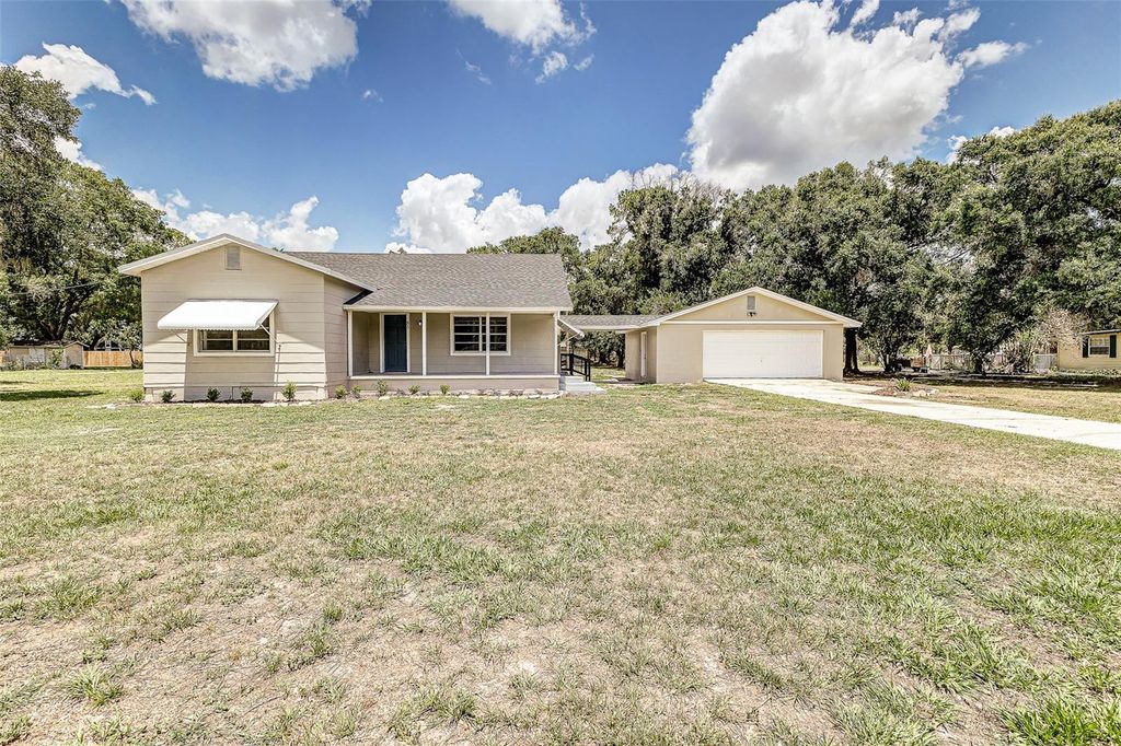 Photo of 85 Temple Street, Mulberry, FL 33860 (MLS # L4962010)
