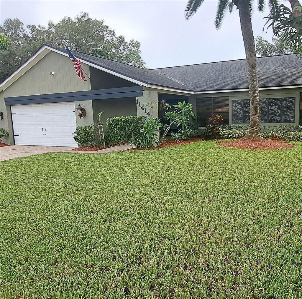 Photo of 11414 Country Oaks Drive, Tampa, FL 33618 (MLS # TB8537172)