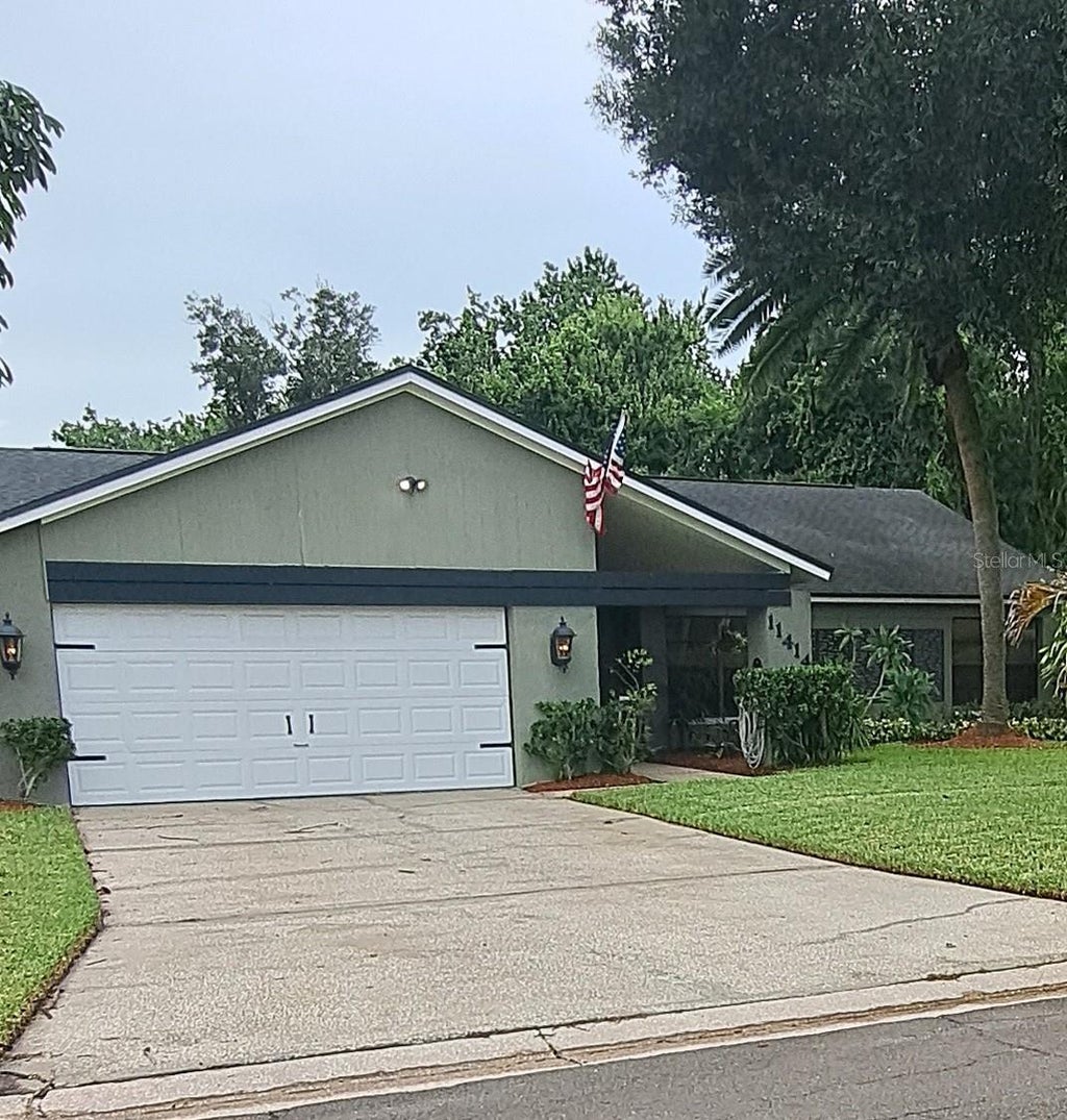 Photo of 11414 Country Oaks Drive, Tampa, FL 33618 (MLS # TB8537172)