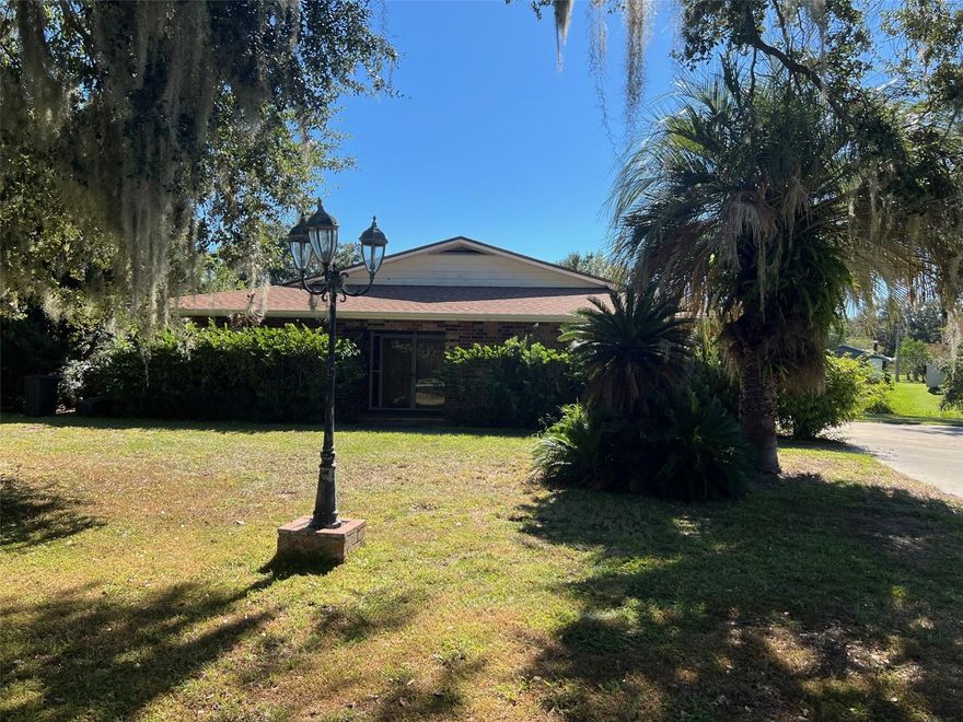 Large house with open floor plan located on a large canal front lot.  House is in need of repairs but has a lot of potential.  Roof is only a couple years old.  The canal leads to Lake Griffin and onto a chain of lakes.
