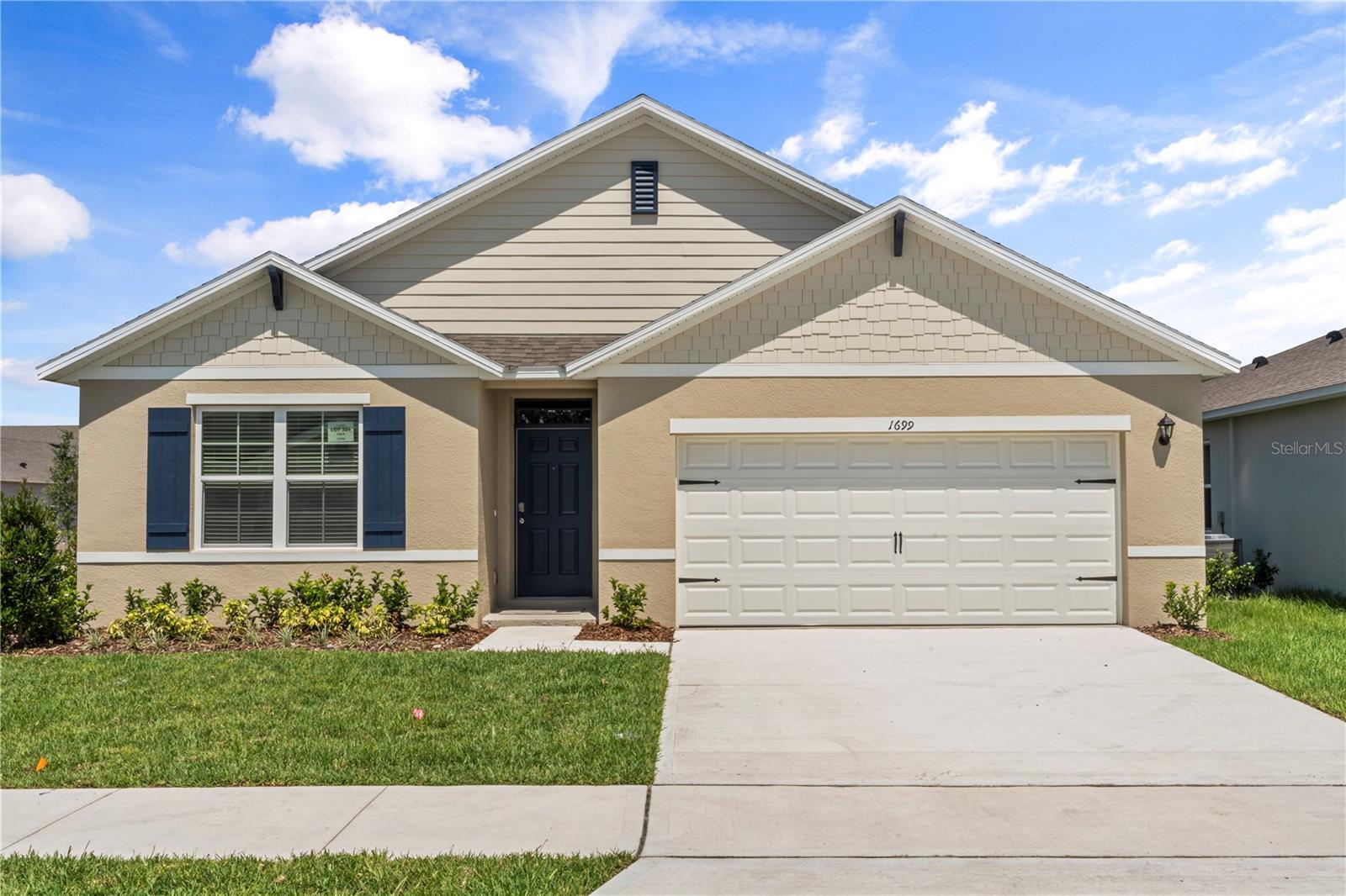 This floor plan offers 4 bedrooms, 2 bathrooms, a 2-car garage with 1,882 sq ft of living space. The open layout connects the living room, dining area, and kitchen, ideal for entertaining. The kitchen boasts quartz countertops, stainless-steel appliances, a walk-in pantry, and a spacious island. The four spacious bedrooms allow flexibility for various lifestyles. The primary suite located in the rear of the home features a private ensuite bathroom with dual sinks, a separate shower, and a walk-in closet. The remaining three bedrooms share one well-appointed bathroom, making morning routines a breeze. The laundry room is convenient to all bedrooms. This all-concrete-block construction home also includes smart home technology for control via smart devices. Lawn care included.