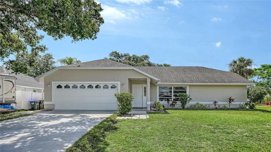 This beautifully refreshed 3-bedroom, 2-bathroom home spans 1,491 sq. ft., this residence offers an inviting atmosphere and peace of mind with significant recent upgrades.  Move right in and enjoy a home that feels like new! The property has been freshly painted inside and out, including the garage, giving it a crisp, clean aesthetic. Functional updates abound, including new toilets, a new washer and dryer, and a brand-new driveway that enhances the home’s curb appeal. New a/c and roof in 2023. The heart of the home features soaring cathedral ceilings in the primary bedroom, living room, and kitchen, creating an airy, expansive feel. The highly desirable split floor plan ensures maximum privacy, separating the primary retreat from the guest bedrooms—making it ideal for families or those who love to host.

Efficiency & Location Enjoy long-term comfort with a new A/C system installed in November 2023. Situated in a great central location, you are just minutes away from local shopping, dining, and major transit routes, putting everything you need within easy reach.