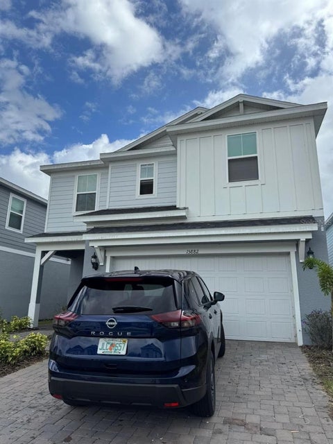 Photo of 15882 Cape Coral Loop, Clermont, FL 34714 (MLS # O6442364)