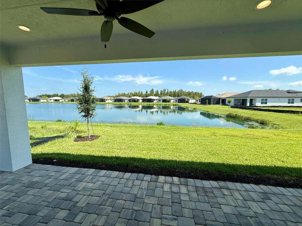 Photo of 3419 Malta Avenue, Wesley Chapel, FL 33543 (MLS # TB8532498)
