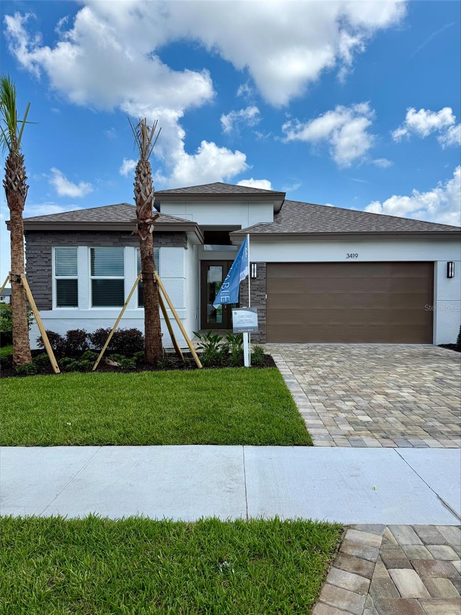 Photo of 3419 Malta Avenue, Wesley Chapel, FL 33543 (MLS # TB8532498)